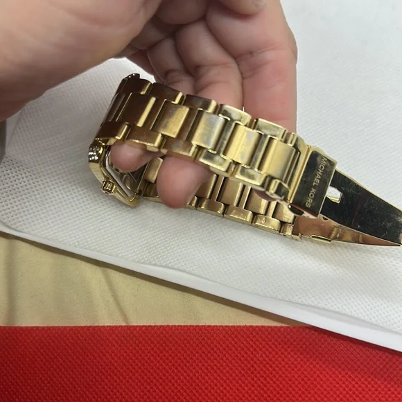 Michael Kors Emery Three-Hand Gold-Tone Stainless Steel Watch - Picture 4 of 4